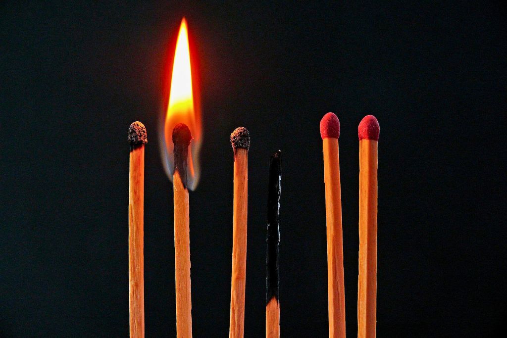 How burnout affects the brain: visual metaphor of mental depletion with burnt matchsticks